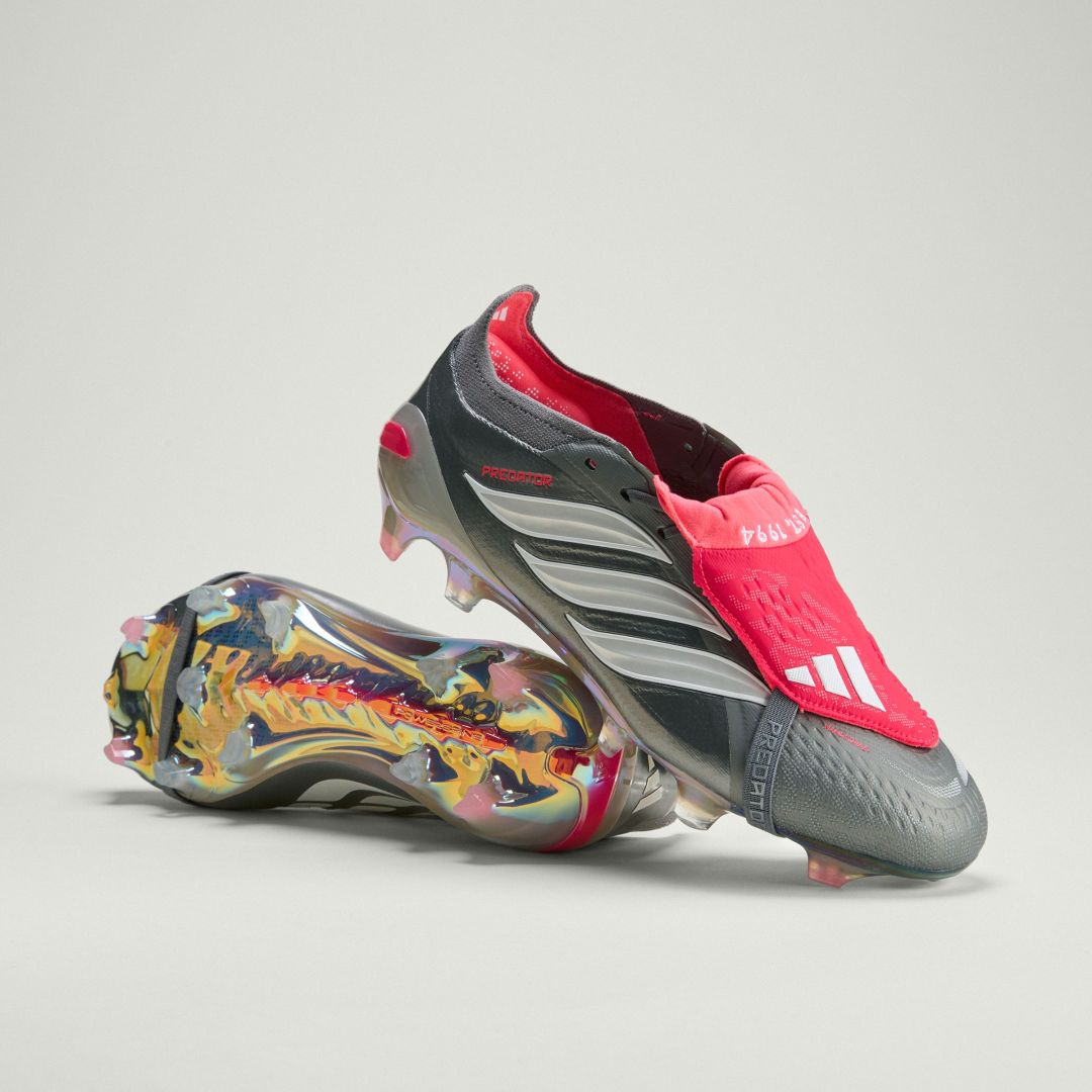 Adidas Predator 26 Elite FG football boots, featuring a red, black, and white colorway designed for precise ball control and power.